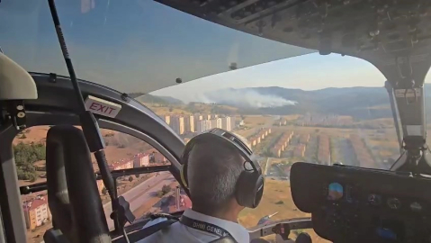 Bakan Uraloğlu, helikopterle yangın bölgesini havadan inceledi