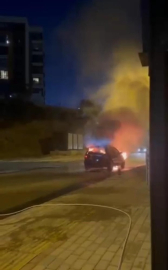 Bursa'da park halindeki otomobil alev aldı