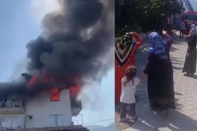 Çocuklarını kurtarmak için alevlerin arasına daldı!