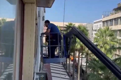 Kapıyı kilitleyerek polisten kaçacağını sandı... Vinç ile yakalandı!