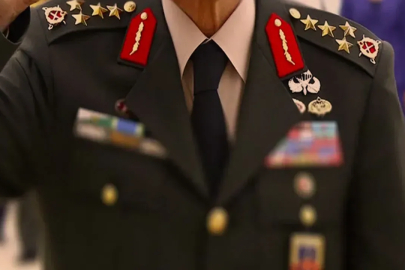 Makam aracıyla insan kaçakçılığı yapan eski generalin cezası belli oldu