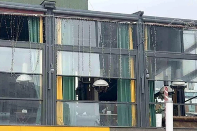 Kafeyi kurşunladı, el bombasıyla kaçtı...