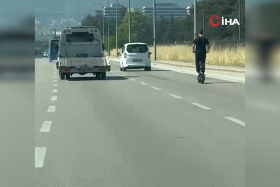 Bursa'da elektrikli scooter üzerinde tehlikeli yolculuk!